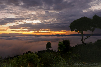 Sunrise with Clouds Below Us