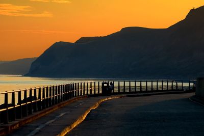 Sunset and railings, West Bay