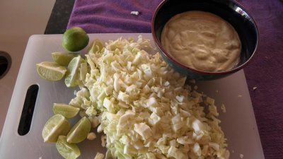 Cut Limes Chopped Cabbage and the White Sause