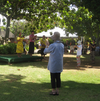 A Japanese tour group got a hula lesson at the Hawaii site.