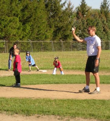 Jeff: the kindergarten pitcher.  Luke is on third base.
