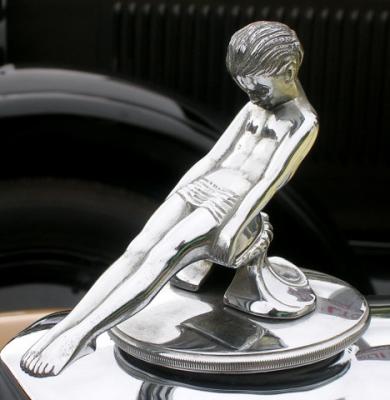 Holding down the Packard radiator cap