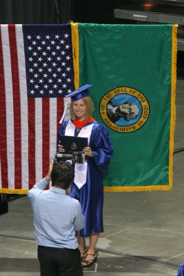 Ashley in front of the flag