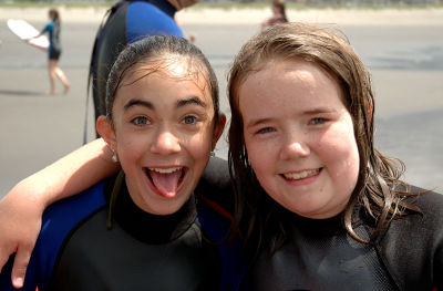 Two surfer girls