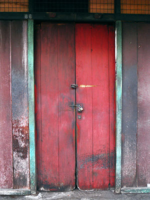 Fading Red Aged Door