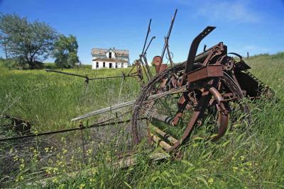 Vacant Farm House and Old Machinery