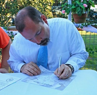  Minister Signs The License