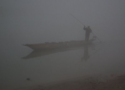 Rapti River and dugout in the mist