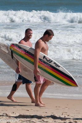 Surfers on Mooloolaba Beach
