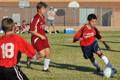 Damian Dribbles Around a Defender.JPG