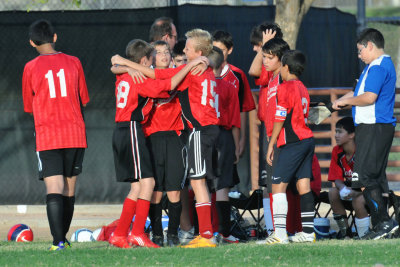 Sideline Group Hug.JPG