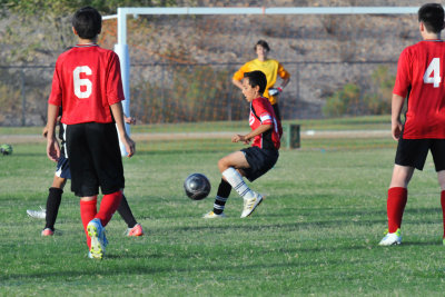 Tebow Traps the Ball.JPG