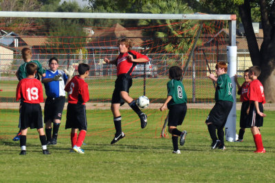 Travis Deflects the Corner Kick.JPG