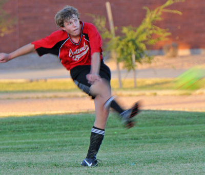 Travis Kicking Blurred.JPG