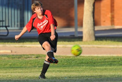 Travis Kicks the Ball.JPG