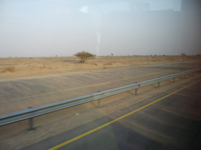 Not snow, but sand blowing across the road as we travel into Oman.