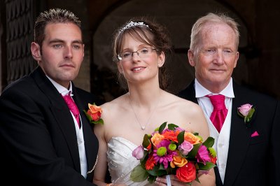 The Bride and Groom with the Bride's Dad