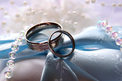 Silver Wedding Rings & Blue Ribbon