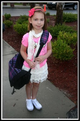 Noelle insisted on a larger than life messenger bag this year instead of a back pack. The bag is massive, but she insisted :-)