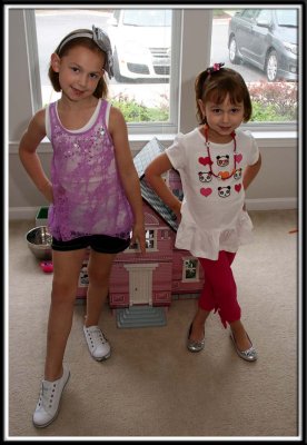It appears the 80's are back... Noelle got a giant bow headband, and they both got slap on bracelets. Haha! Deja vu! :-)