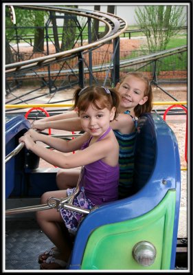 Noelle and Kylie on the kiddie roller coaster! They were quite proud that we let them go on it alone :-)