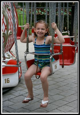 Noelle on the swings