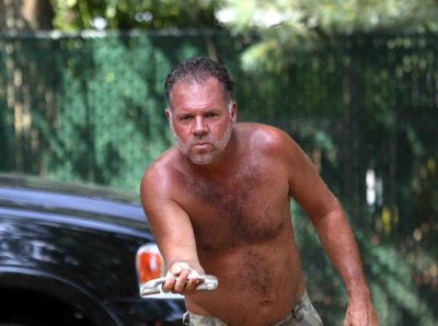 Home Boy Larry gets ready to fire another shoe at the red neck Olympics 