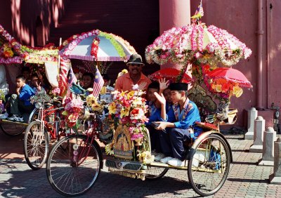 Schoolboys in rickshaws