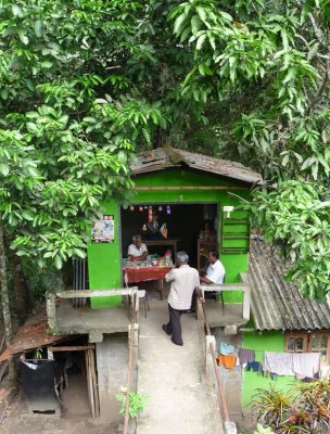 Shop below railway embankment