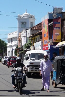 Street scene with mosque in background