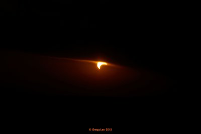 Solar Eclipse at Sunset