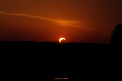 Solar Eclipse at Sunset