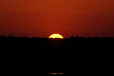 Solar Eclipse at Sunset