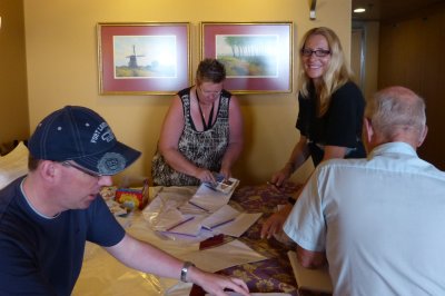 Martin putting in stickers, Peggy & Gretchen putting in the puzzles