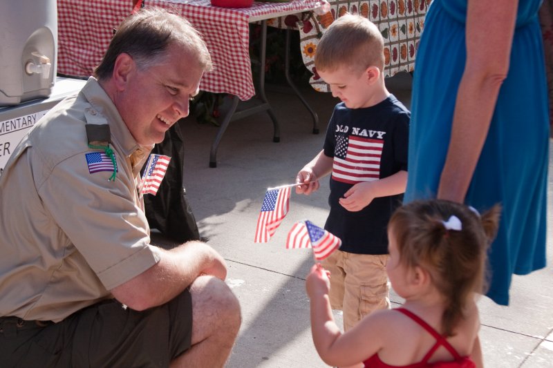 Free flags, water and lemonade from the Boy Scouts...