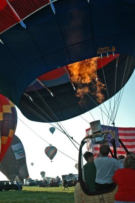 As the Air Is Heated, the Balloon Begins to Rise ...