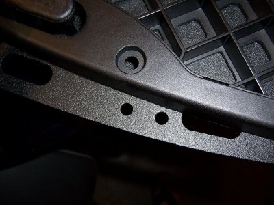 Hole unde grommets line up with holes on OHFJR rack