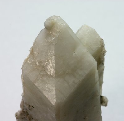 Microcline, 7.5 cm white Baveno twinned crystal. Shengus (Shingus), Haramosh Mts., Skardu District, Baltistan, Northern Areas, P