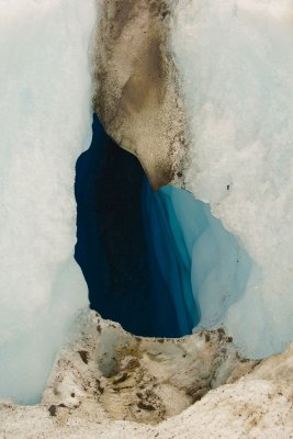 The blue of a small glacier mill