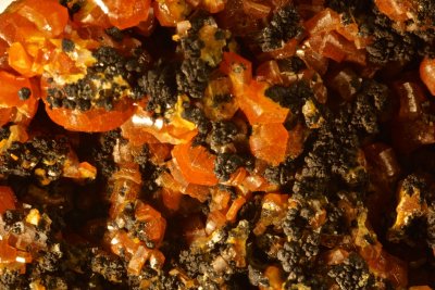 Mimetite var campylite in crystals to approximately 6 mm with romanechite. Drygill, Caldbeck Fells.