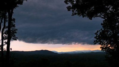 A SUMMER STORM APPROACHES THE MILLS RIVER VALLEY JUST BEFORE SUNSET  -  ISO 80