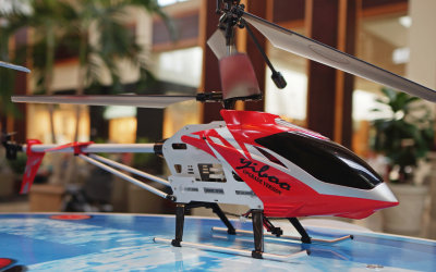 A RADIO COLTROLLED TOY HELICOPTER  -  FOR SALE IN A KIOSK IN THE SOUTH PARK MALL, CHARLOTTE, NORTH CAROLINA