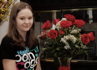 GRANDDAUGHTER WITH HER FLOWERS  -  TAKEN WITH A MANUAL FOCUS MINOLTA ROKKOR MD 50mm F/1.4 LEGACY LENS
