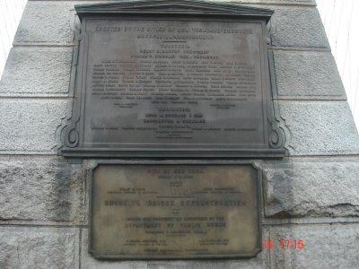 a plaque on the bridge towers