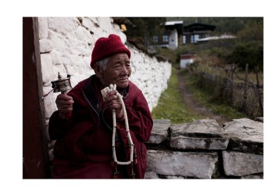 Woman by temple, Bhutan