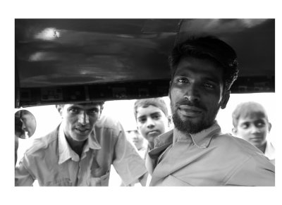 Autorickshaw driver with friends