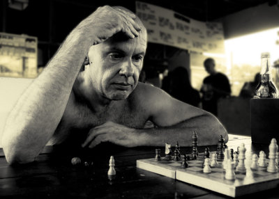 Don doing chess on Don Det.