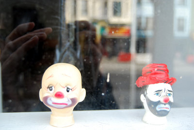 sad clowns [in-the-window] faces