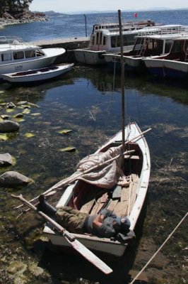 Hard working boatman on Lake Titicaca