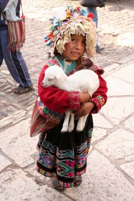 Cute kid in Pisac will pose for money